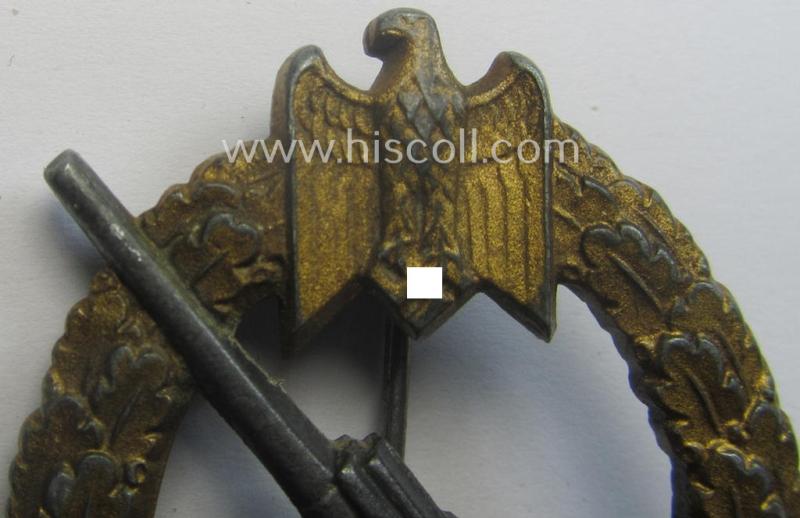 WH (KM) 'Marine-Artillerie-Abzeichen' being a maker- (ie. 'F.L.L. - 43'-) marked- and/or zinc- (ie. 'Feinzink'-) based example by the: 'Friedrich Linden'-company