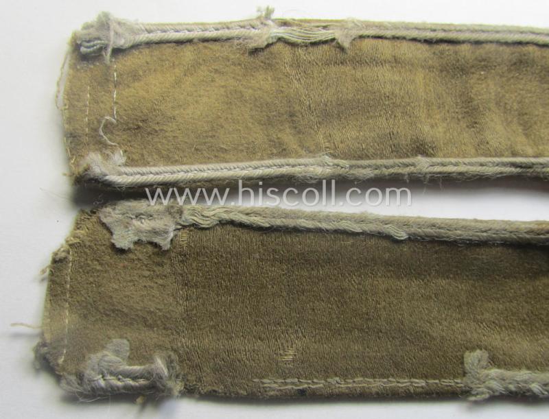 WH cuff-title (ie. 'Ärmelstreifen') entitled: 'Afrika' (being an example that bears a printed 'RbN.'-numeral ('RBN.0/0250/2340') and that comes in an issued, clearly worn- and/or most certainly once tunic-attached, condition)