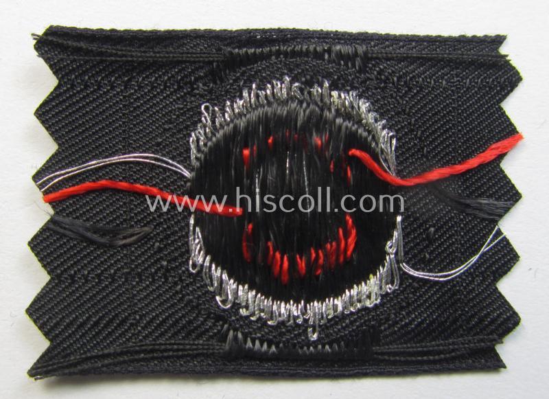 Superb - and rarely found! - WH (Heeres) Pz-cap-cocarde as executed in flatwire 'BeVo'-weave pattern onto a black-coloured background as was intended for usage on the black-coloured Pz-officer-type side-caps (ie. 'Schiffchenmützen')