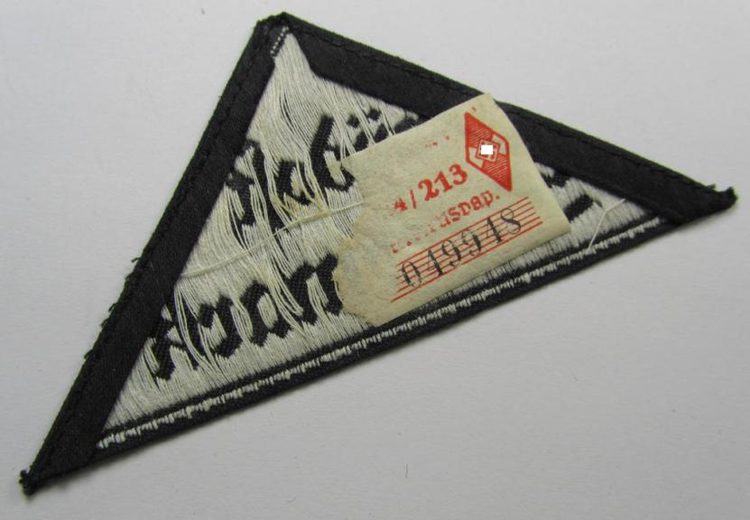 'HJ' ('Hitlerjugend') ie. 'BDM' ('Bund Deutscher Mädel'-) district-triangle (ie. 'Gebietsdreieck') entitled: 'Südost Steiermark' (being a 'virtually mint- ie. unissued' example that still retains most of its paper-based 'RzM'-etiket)