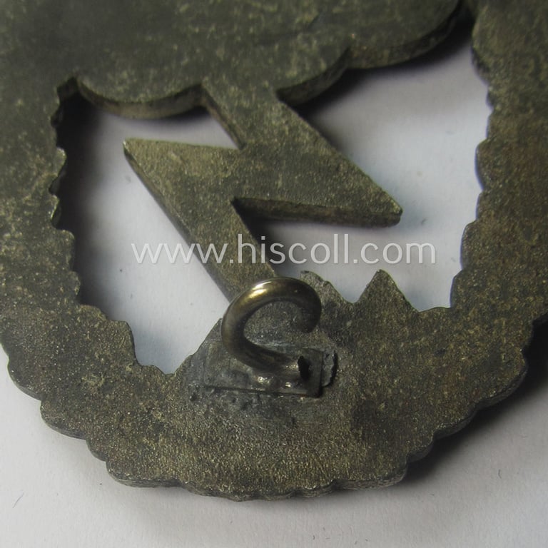 Mid- (ie. later-) war-period, zinc- (ie.'Feinzink'-) based version of a WH (Luftwaffe) 'Erdkampfabzeichen' (being a maker-marked example by the 'G.H. Osang'-company)