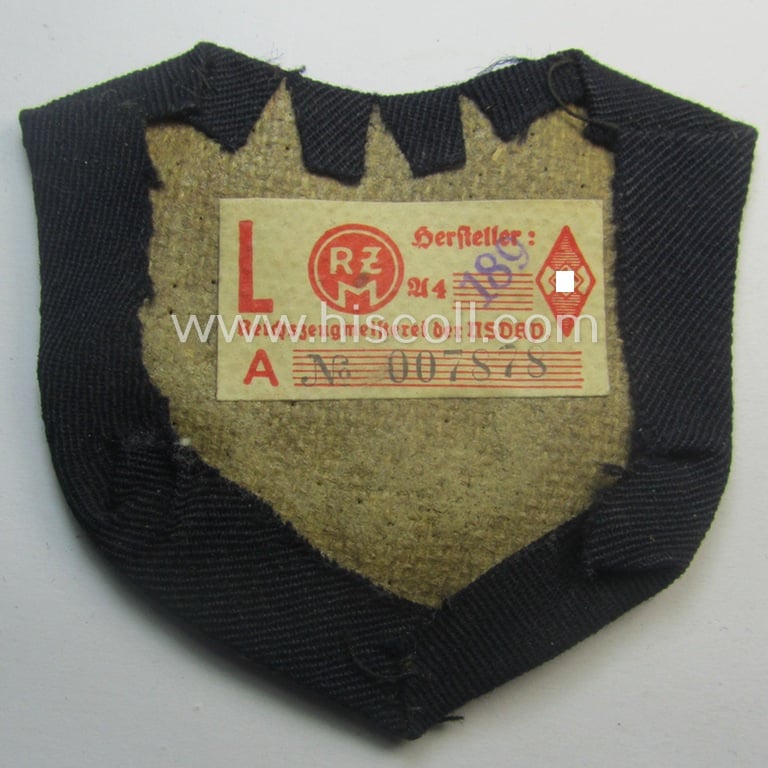 Superb - and rarely encountered! - neatly hand-embroidered, HJ/BDM ('Hitlerjugend' ie.: 'Bund Deutscher Mädel') 'Ärmelabzeichen für Fahnenträger der Bund Deutscher Mädel' being a hardly used- nor worn example that still retains its 'RzM'-etiket