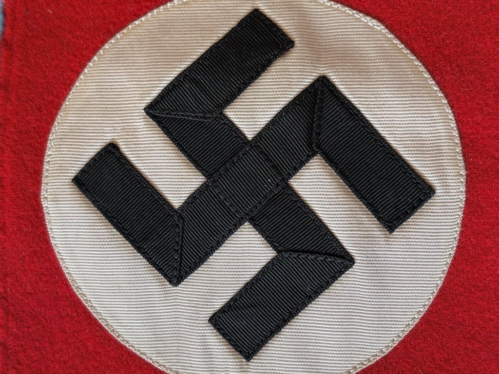 AUTHENTIC WWII GERMAN THIRD REICH ORTSGRUPPENLEITER ARMBAND WITH RZM LABEL.