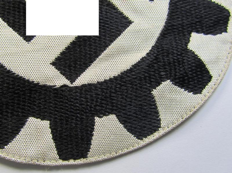 Neat, 'DAF' (ie. 'Deutsches Arbeitsfront o. Werkschar'-) related sport-shirt emblem as executed in 'BeVo'-weave pattern that shows the remains of an 'RzM'-etiket and that comes in a moderatetely used- ie. I deem shirt-removed-, condition