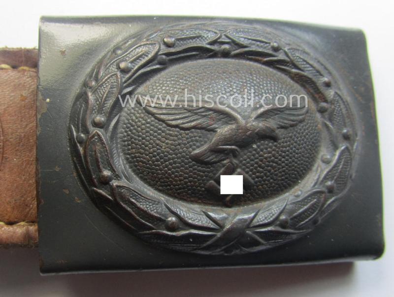 WH (Luftwaffe) blue-coloured- and/or steel-based belt-buckle, being a neatly maker- (ie. 'F.W. Assmann'-) marked and/or: '1941'-dated example that comes mounted onto its period, natural-coloured and/or leather-based tab