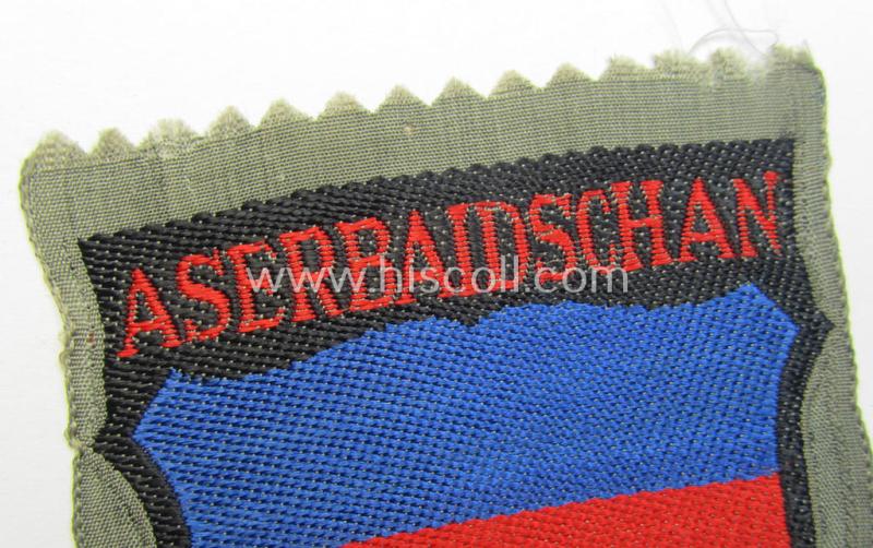 Neat, 'BeVo'-type armshield entitled: 'Aserbaidschan', being a piece as intended for a volunteer who served within the 'Deutsche Wehrmacht' ie. within the 'Aserbaidschanisches Legion'