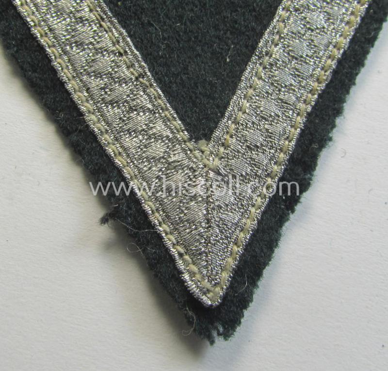Neat - and just moderatelly used! - WH (Heeres) 'Armwinkel' (or: arm-chevron) as executed on typical darker-green-coloured wool as was specifically intended for usage by a soldier with the rank of: 'Gefreiter'