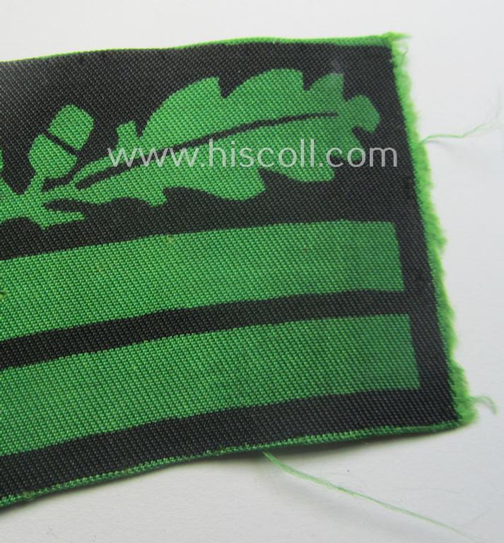 Moderately used - albeit regrettably single! - officers'-pattern, WH (Heeres o. Waffen-SS) rank-insignia-bar (for usage on the camouflaged-uniforms) as used by an officer holding the rank of: 'Oberleutnant' (ie.: 'SS-Obersturmführer')