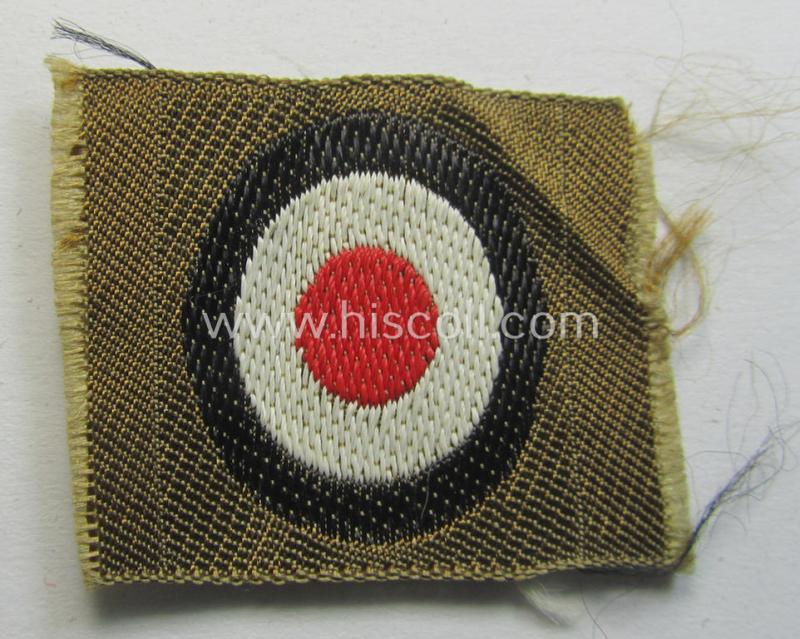 Superb, WH (Heeres) 'tropical-issue' (ie. DAK or: 'Deutsches Afrika Korps'-related-) side-cap-eagle and dito cocarde-set as executed in 'BeVo'-weave-pattern (both insignia-pieces coming in an overall very nice- ie. 'virtually mint' condition)