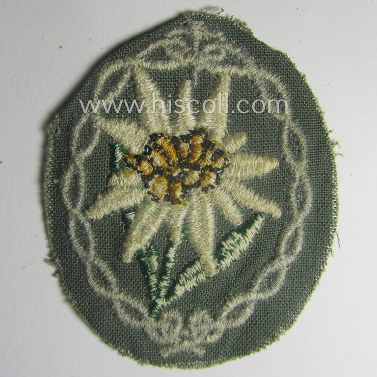 'Variant'-pattern, WH (Heeres) 'Gebirgsjäger'- (ie. mountain-troopers-) related arm-badge, being a desirable example as was executed in the machine-woven pattern on a thin-shaped and/or field-grey-toned background