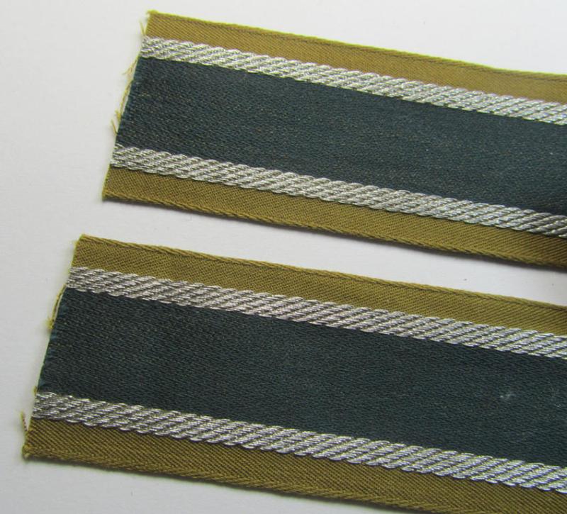 Superb, 'BeVo'-like cuff-title (ie. 'Ärmelstreifen') entitled: 'Afrikakorps' being a presumably issued but never worn example that comes in an overall very nice- (ie. non-shortened- and never tunic-attached-), condition