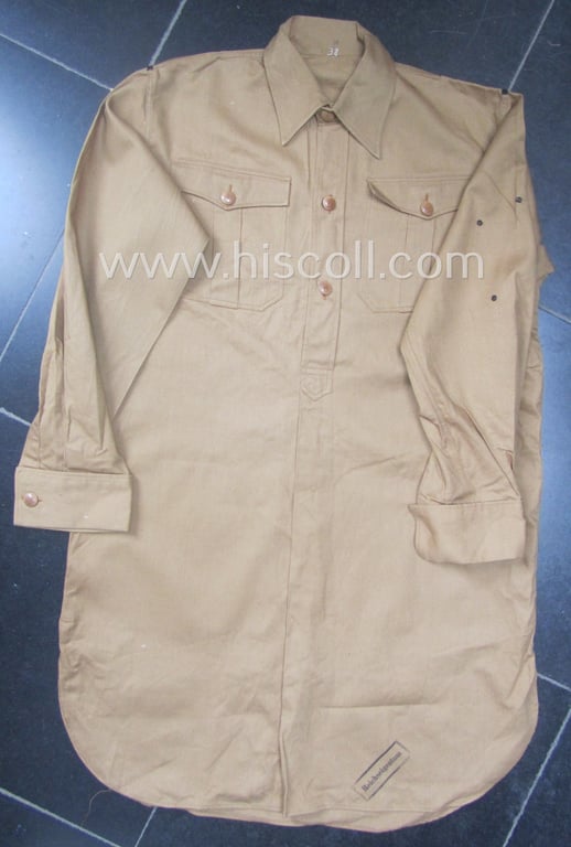 Hardly used, HJ- (ie. 'Hitler-Jugend'-) 'standard-issue'-pattern, beige-brown- (ie. 'braunes'-) coloured: 'under-the-tunic'-shirt (ie. 'Braunhemd nach Vorschrift des RJF') that comes in a wonderful condition