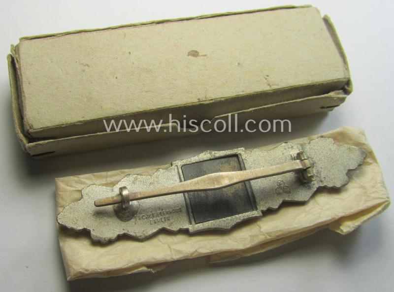 'Nahkampfspange in Silber' being a maker- (ie. 'FLL'-) marked so-called: '3rd pattern'-specimen that came in its (rare!) carton-based box