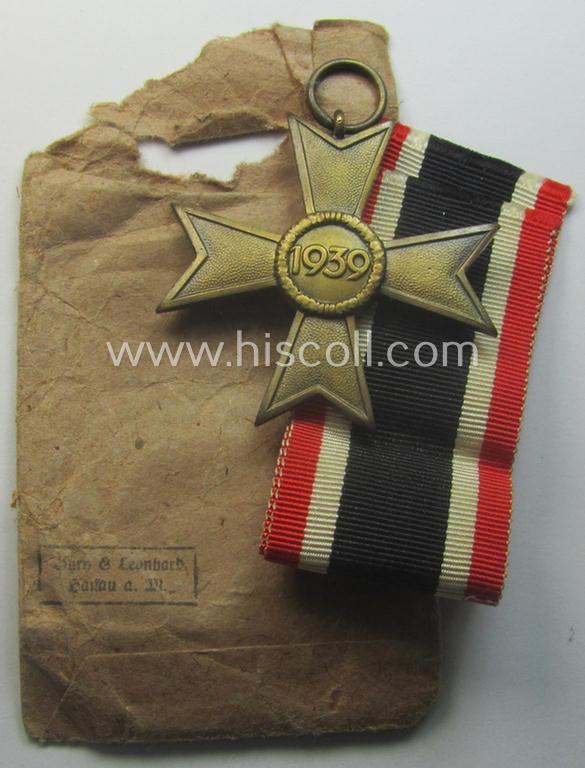 Fully matching medal-set: 'KvK 2. Klasse o. Schwn.' being a clearly maker- (ie. '36'-) marked specimen that comes in its (incomplete ie. relic) pouch by the 'Hersteller': 'Burg & Leonhard - Hanau a. M.'