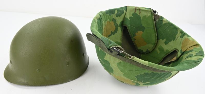 US Vietnam War Infantry helmet with camouflage cover and liner