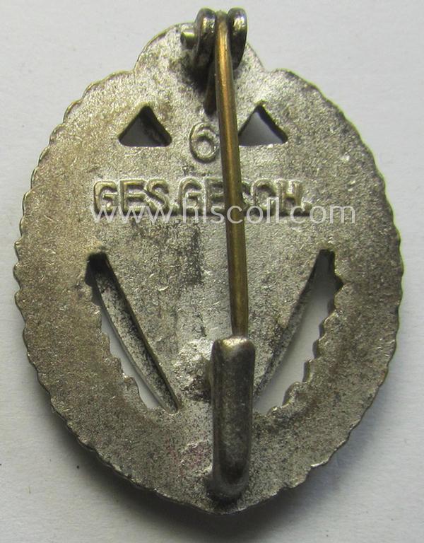 'Silberne Ehrennadel für 25 Jahre Mitgliedschaft im Nat.Soz. Reichskriegerbund' (ie. 'N.S.R.K.B.') being a maker- (ie. '6'-) marked example that comes stored in its period, 'Cellophan'-based pouch