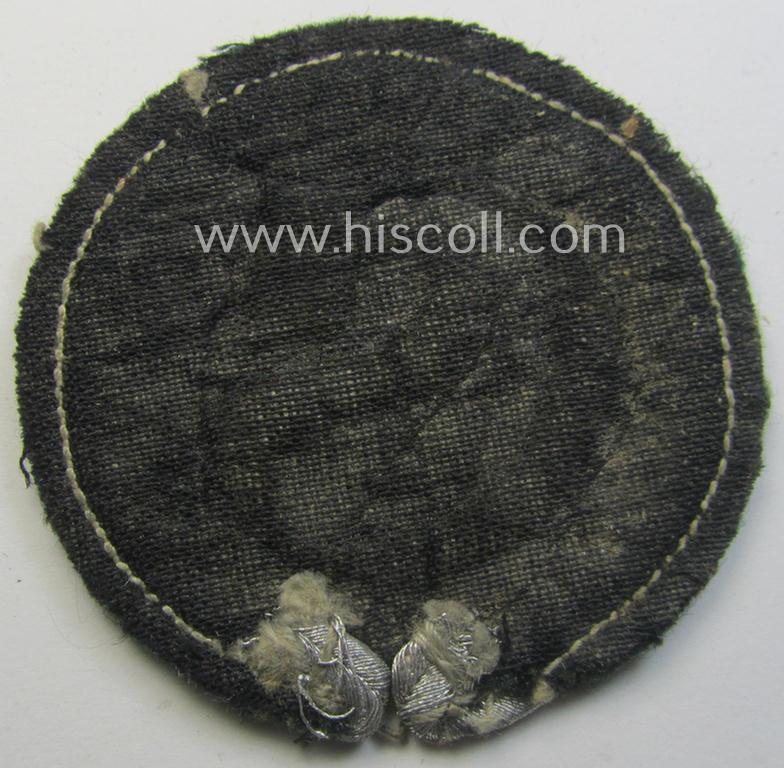 WH (Heeres) machine-embroidered, trade- and/or special-career insignia (ie. 'Tätigkeitsabzeichen') as executed on a darker-green-coloured background as was intended for a: 'geprüfter Schirrmeister'