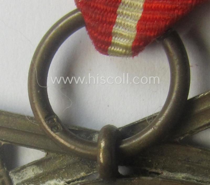 'Deutsche Bronzene Verdienstmedaille des Deutschen Adler Ordens mit Schwn.' (being a typical '30'-marked example)