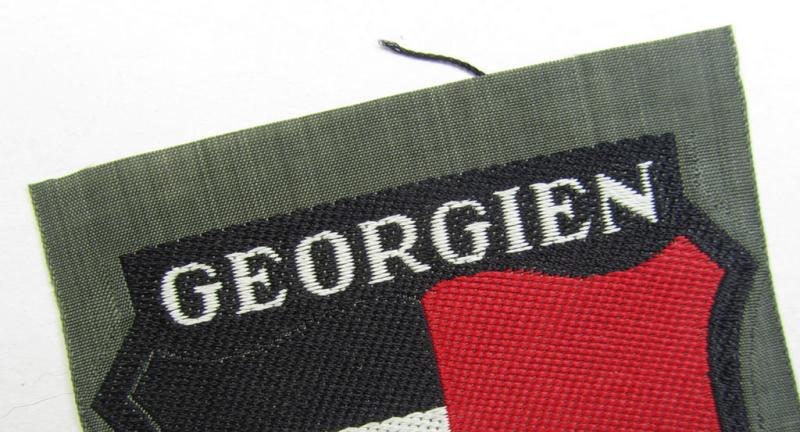 Superb, 'BeVo'-type armshield entitled: 'Georgien' (being a 'virtually mint- ie. unissued' example as intended for a volunteer who served within the 'Deutsche Wehrmacht' ie. within the 'Georgisches Legion')