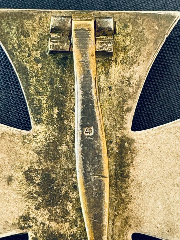 RARE CONCURVED WWII 1ST CLASS IRON CROSS STAMPED NUMBER 4, STEINHAUER & LUCK OF LUDENSCHHELD.