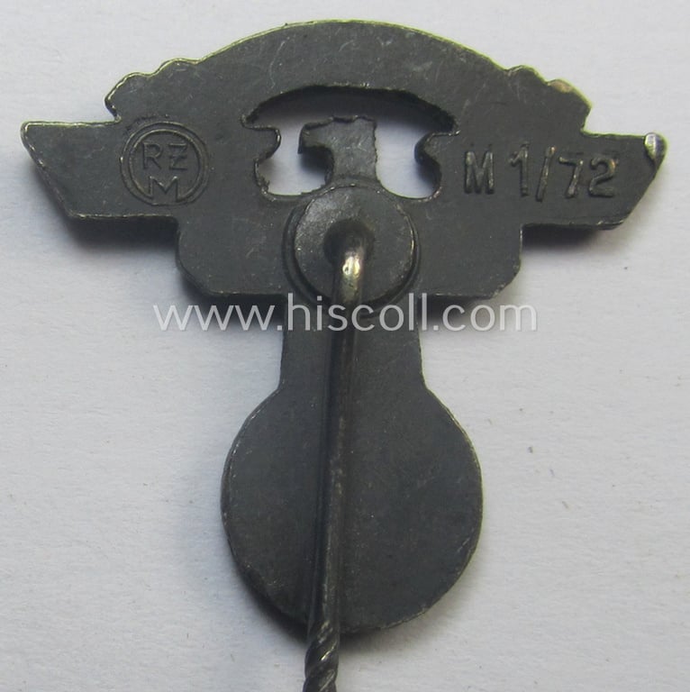 Silver-toned - and 'Feinzink'-based - lapel-pin (ie. 'Zivilabzeichen') being a maker- (ie. 'RzM M1/72'-) marked example to be worn on the civil attire by the various staff-members of the N.S.K.K. (ie. 'National Soc. Kraftfahr Korps')