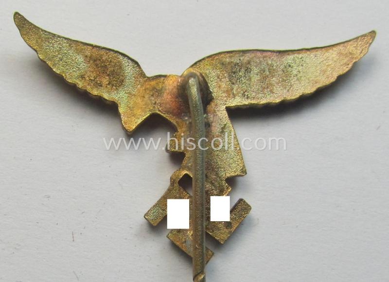 Bright-golden-toned lapel-pin (ie. 'Zivilabzeichen') to be worn on the civil attire as was intended for usage by the various staff-members of the 'Luftwaffe' (depicting an early-pattern- ie. 'down-tailed'-eagle)