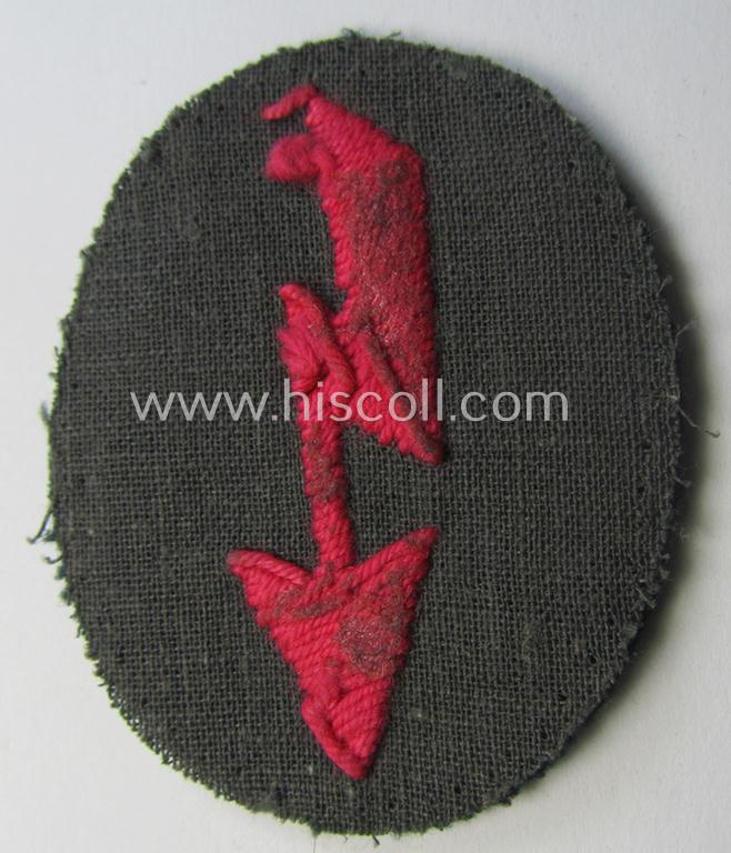 WH (Heeres) trade- and/or special-career-insignia ie. hand-embroidered 'signal-blitz' being a non-maker-marked and hand-embroidered example as executed in pink linnen as was specifically intended for a soldier within the: 'Pz- o. Panzerjäger-Trupp...