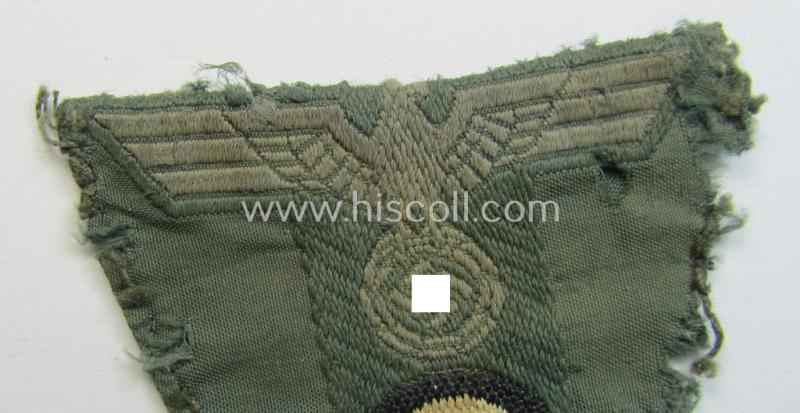 WH (Heeres) 'T-shaped' M42-model cap-eagle/cocarde as executed in 'BeVo'-weave pattern (being a minimally stained example that comes in a clearly used- ie. once cap-attached, condition)