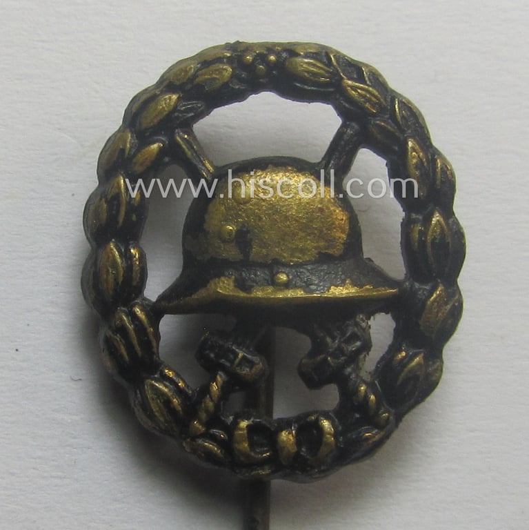 WWI-period - and 17 mm. sized! - miniature lapel-pin (ie. 'Halbminiatur') depicting a: 'Verwundeten-Abzeichen in Schwarz' (or: black-class wound-badge) being a non-maker-marked example of the 'durchbrochner'-pattern