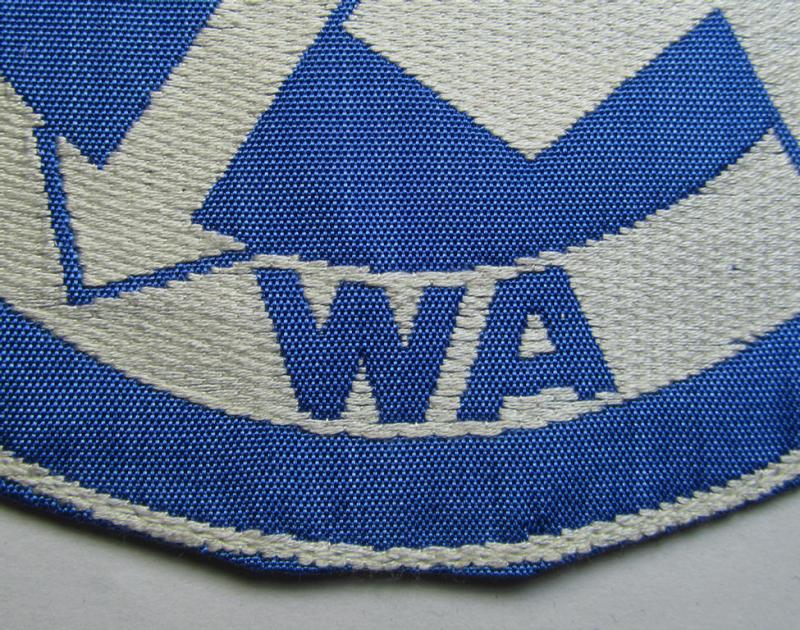 Attractive - and scarcely encountered! - SA (ie. 'Sturmabteilungen'), 'BeVo'-woven sport-shirt insignia still showing its period-attached 'RzM'-etiket as was intended for an SA-member who served within the: 'Gruppe Wartheland' (WA)