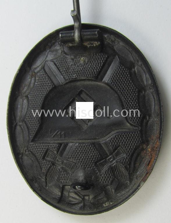 Neat, maker- (ie. 'L/11'-) marked example of a black-class wound-badge (or: 'Verwundeten-Abzeichen in Schwarz') being an example that was produced by the maker (ie. 'Hersteller') named: 'Wilhelm Deumer'