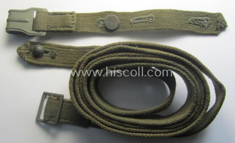 Complete, 2-pieced 'standard-issue'-pattern- (ie. typical WH-issue) carrying-strap (ie. 'Tragelasche') as was intended for the various gasmask-containers (being a maker-marked example that comes in a just minimally used, condition)