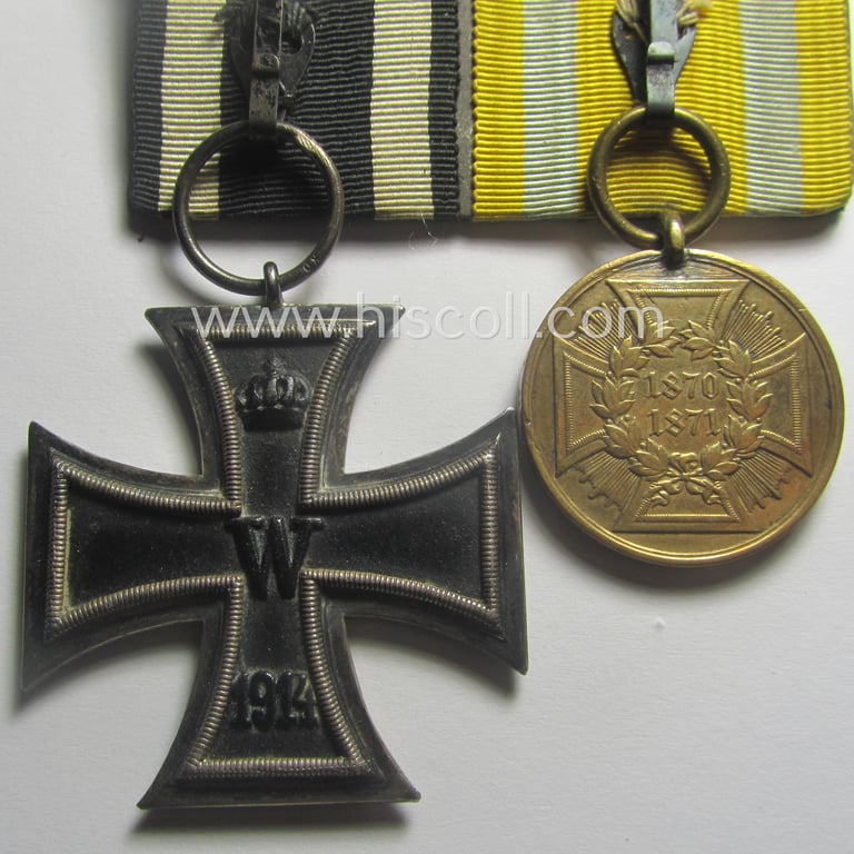 WWI-period, so-called: 'Doppelspange' (being of the 'non-detachable'-pattern!) showing resp. a WWI-pattern: 'EK II. Klasse' and a golden-toned: 'Kriegsdenkmünze für die Feldzüge 1870-71'