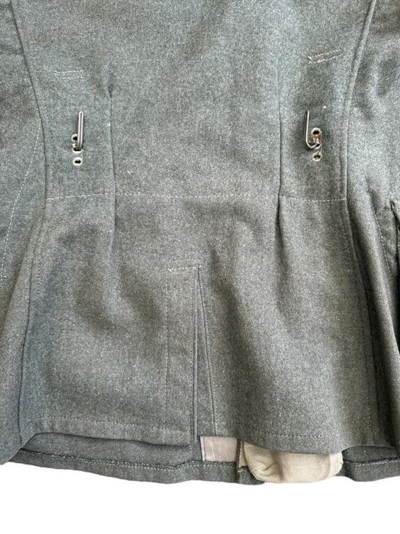Wehrmacht Heer M43 EM field tunic With Original Applied Insignia