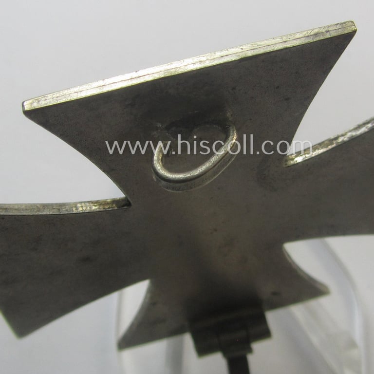 'Eisernes Kreuz 1. Klasse' (ie. Iron Cross 1st class) being a (typical) non-maker-marked example that was (I deem) produced by the desirable 'Hersteller' named: 'B.H. Mayer's Kunstprägeanstalt'