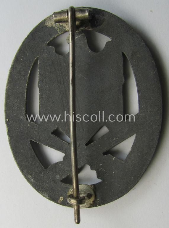 'Allgemeines Sturmabzeichen' being a non-maker-marked, zinc- (ie. 'Feinzink'-) based example by: 'C.E. Juncker'