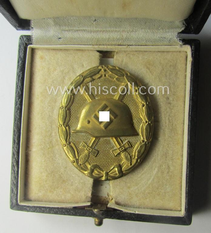 'Verwundeten-Abzeichen in Gold' being a clearly maker- (ie. '30'-) marked- and typical 'Buntmetall'-based (ie. 'flat-pinned'!) example that comes stored in its maker- (ie. 'Hauptmünzamt - Wien'-) marked etui as issued