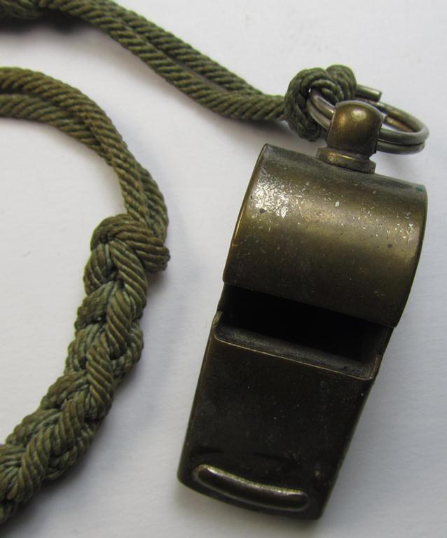 WH (Heeres, Kriegsmarine etc.) personal-equipment-item: a silver-coloured- and (I deem) copper based flute (ie. 'Flöte') that comes mounted onto its original (greyish-coloured- and/or twisted) 'lanyard'