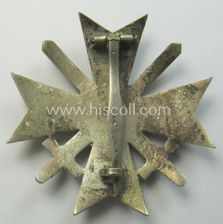 Truly vaulted, 'Kriegsverdienstkreuz 1. Klasse mit Schwertern' as executed in typical, silverish-coloured metal (ie. 'Buntmetall') being a clearly maker- (ie. '1'-) marked specimen by the desirable maker: 'Deschler & Sohn'