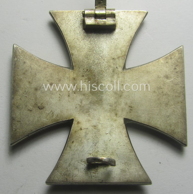 'Eisernes Kreuz 1. Kl.' (or: Iron Cross 1st class) being a typical maker- (ie. '15'-) marked (and non-magnetic!) example that as was produced by the Austrian maker (ie. 'Hersteller'): 'Friedrich Orth'