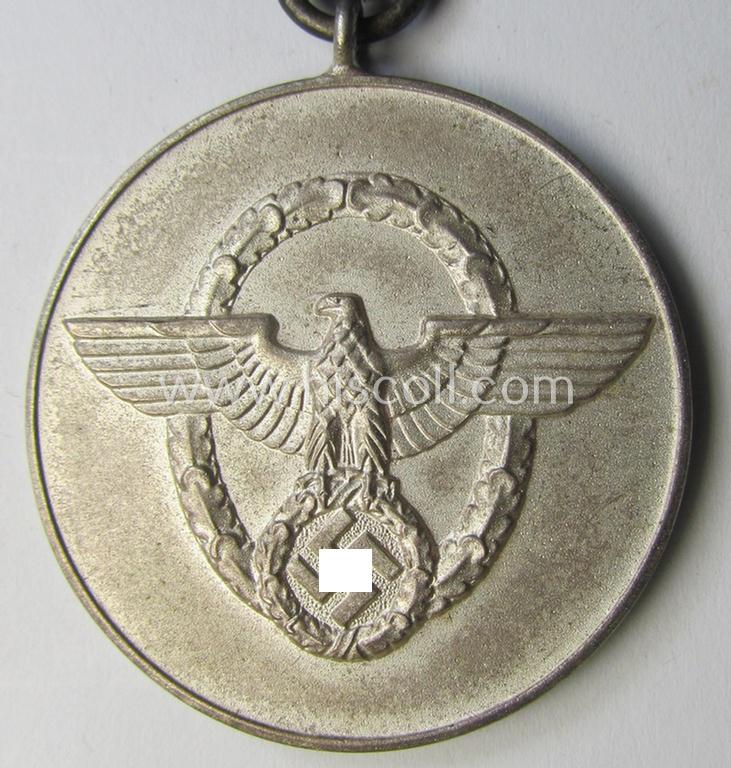 Attractive, bright-silver-toned so-called: 'Polizei-Dienstauszeichnung der 3. Stufe' (or: police loyal service medal of the 3rd class as was awarded for 8 years of service) that comes mounted on its period ribbon (ie. 'Bandabschnitt') as issued