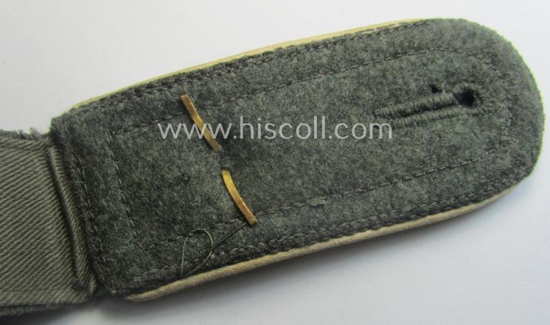 Single, WH (Heeres) NCO-type (ie. 'M40'- ie. 'M43'-pattern) shoulderstrap having the white-coloured branchcolour as was intended for - and clearly worn by! - a: 'Feldwebel der Infanterie-Trpn.'