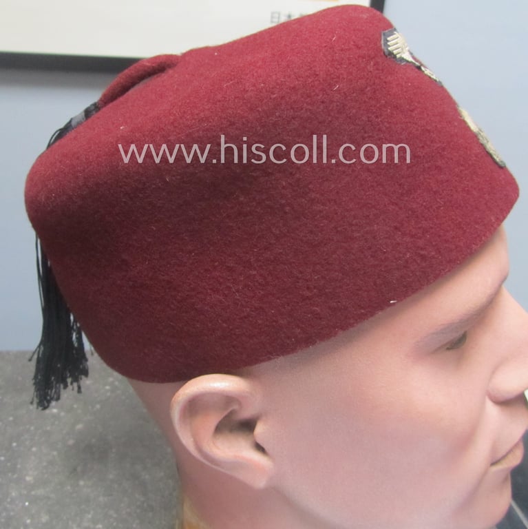 Superb, maroon-red-coloured, Waffen-SS-pattern so-called: 'Fez' having a neat - and fully matching! - silver-grey-coloured- and/or 'BeVo'-woven insignia-set originally- (ie. 'off-factory'-) attached