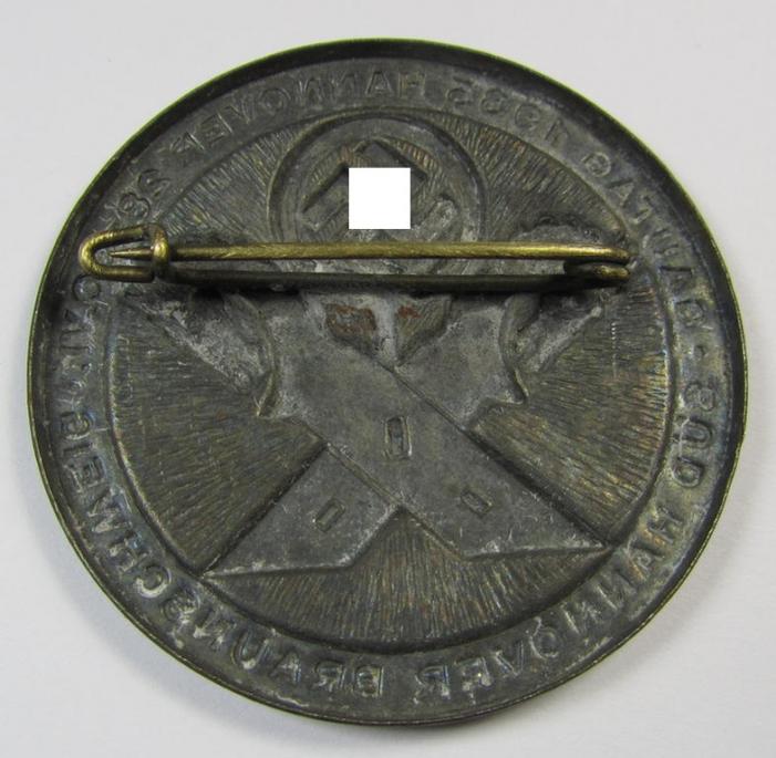 Detailed and pronounced, silverish-black-coloured N.S.D.A.P.-related day-badge (ie. 'tinnie' or: 'Veranstaltungsabzeichen') as was issued to commemorate the: 'Gautag 1935 - Hannover - 28.-30-1935 - Süd-Hannover-Braunschweig'