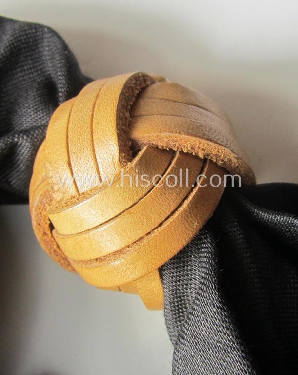 'HJ' ('Hitlerjugend') ie. 'BDM' (or: 'Bund Deutscher Mädel') so-called: 'Halstuch' as executed in typical black-coloured linnen still retaining its period RzM-etiket (and that comes with its leather-based 'Knote')