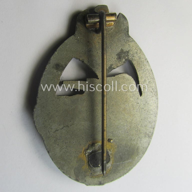 Incomplete 'Panzerkampfabzeichen in Bronze' (or: bronze-class panzer assault badge or PAB) being a neat (I deem) somewhat later-war-period zinc- (ie. 'Feinzink'-) version as was procuced by the: 'Frank u. Reif'-company