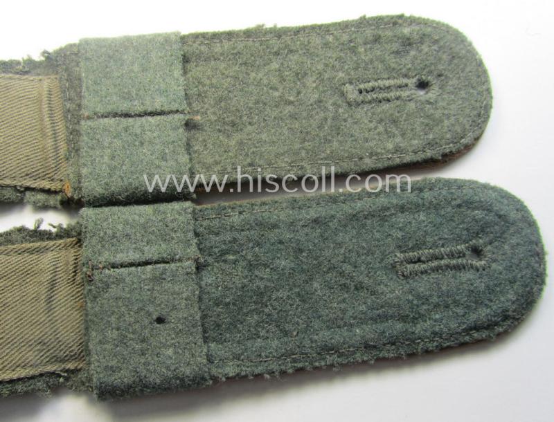 Pair of mid-war-period, so-called: 'M41 o. M43'-pattern, WH (Heeres) EM-type shoulderstraps that comes with its accompanying 'Überschube'-pair as was intended for a: Soldat des Kradschützen-Btls. 12 der Pz.Div. u. Inf.Div. (mot)'