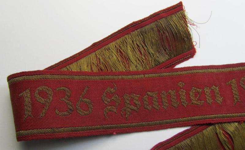 Stunning - and extremely rarely encountered! - WH (Heeres) ie. 'Legion Condor'-related cuff-title (ie. 'Traditions-Ärmelstreifen') as executed in so-called: 'flat-wire'-style- (ie. 'BeVo'-weave-) pattern and that is entitled: '1936 Spanien 1...