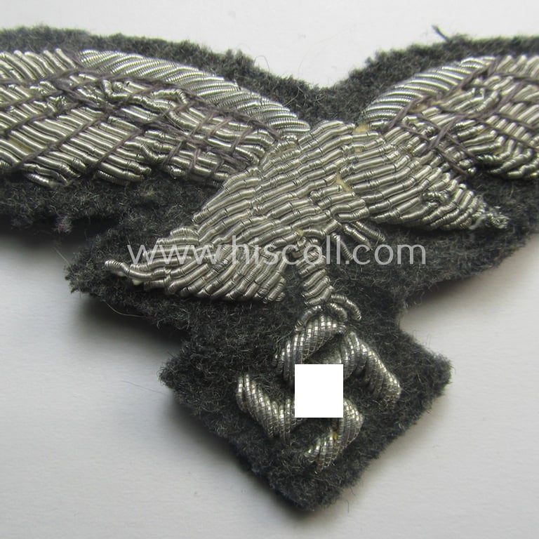 WH (Luftwaffe) officers'-pattern breast-eagle (ie. 'Brustadler für Offiziere der Luftwaffe') being a neatly hand-embroidered example of the: 'Extra Qualität' that comes in a moderately used- (ie. carefully tunic-removed-), condition