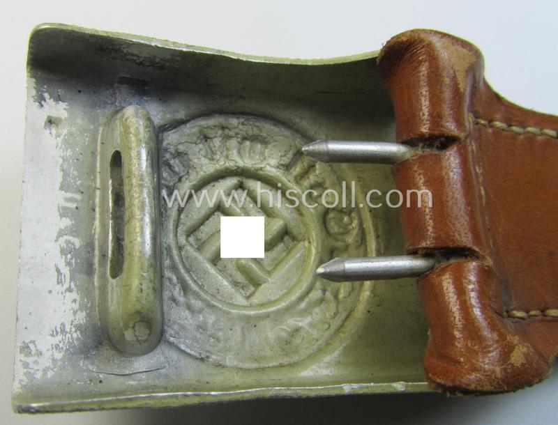 Superb, police (ie. 'Polizei') aluminium-based belt-buckle (ie. 'Koppelschloss für Mannschaften u. Uffz. der Polizei') being a maker- (ie. 'Dransfeld & Co.'-) marked and '1940'-dated example that comes in a fully untouched, condition